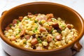 salad of  yellow peas, bacon and parsley Royalty Free Stock Photo