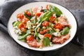 Salade Aveyronnaise beautiful French salad has bacon, walnuts, and Roquefort cheese, creating a balance of nutty, savory, and