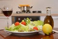 Mix salade tomato oil lemon wine olive