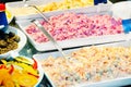 Salads, snacks and appetizers on counter Royalty Free Stock Photo