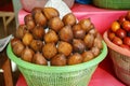 Salak Bali or Snake fruit in plastic basket Royalty Free Stock Photo