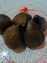 Salak fruit, tastes sweet and sour astringent.