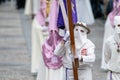 SALAMANCA, SPAIN - APRIL 18, 2019: Typical scene of the Spanish Holy Week, with religious wearing the typical Easter cap, and one Royalty Free Stock Photo