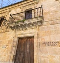 Handwritten sign on the wall in Salamanca in traditional style