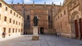 Salamanca, Spain, November 15, 2023. Plateresque doorway of the University of Salamanca and statue of Fray Luis de Leon.