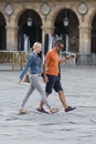 A couple stroll in Salamanca Spain