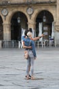 A couple takes a selfie with their smartphone