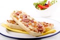 Salami baguette with onion and fresh salad Royalty Free Stock Photo
