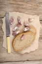 Salami and bread on an old kitchen table Royalty Free Stock Photo