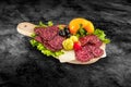 Salami sausage slice and vegetables on wooden board with clipping path Royalty Free Stock Photo