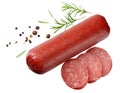 Salami smoked sausage with slices, rosemary and peppercorns isolated on white background. top view Royalty Free Stock Photo