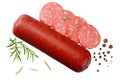 Salami smoked sausage with slices, rosemary and peppercorns isolated on white background. top view Royalty Free Stock Photo