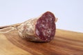 Salami on wood trencher Royalty Free Stock Photo