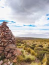 Salar de uyuni bolivia with rock stacks in foreground