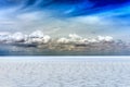 Salar de Uyuni Bolivia salt desert and cloudy sky Royalty Free Stock Photo