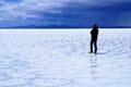 Salar de Uyuni Bolivia salt desert - lonely man standing Royalty Free Stock Photo