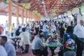 Salaried employees eat at a hawker center during lunch break in Singapore, Asia