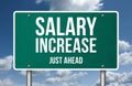 Salary increase just ahead - road sign message