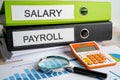 Salary Payroll. Binder data finance report business with graph analysis in office Royalty Free Stock Photo