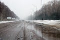 Salavat, Russia - February 26, 2017: dangerous driving in snowstorm, street road in blizzard