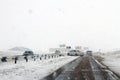Salavat, Russia - February 26, 2017: highway with cars in blizzard, dangerous driving in snowstorm
