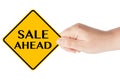 Sale Ahead traffic sign with hand Royalty Free Stock Photo