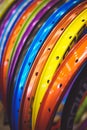 Sale beautiful colored bicycle rim stand in a row of different colors Royalty Free Stock Photo