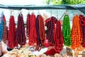 Sale of beautiful colorful women`s jewelry made of wooden beads. Fair - an exhibition of folk craftsmen Royalty Free Stock Photo