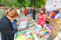 Sale of books on the embankment of the Volga River in a summer day.