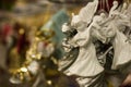 Sale of Christmas toys in the supermarket. Ceramic angel - New Year`s toy. Royalty Free Stock Photo