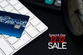 12.12 sale concept, closeup credit card on black enter button, convenience shopping concept