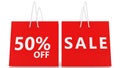 Sale concept with percents on red shopping bags