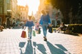 sale, consumerism, money and people concept - happy young woman with shopping bags and credit card in mall Royalty Free Stock Photo