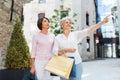 Senior women with shopping bags walking in city Royalty Free Stock Photo