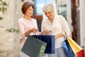 Senior women with shopping bags in city Royalty Free Stock Photo