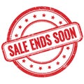 SALE ENDS SOON text on red grungy round rubber stamp Royalty Free Stock Photo