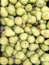 Sale of green sweet pears in large quantities Royalty Free Stock Photo