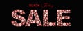 SALE inscription made of Red Crystal letters. Black Friday jewelry shop banner concept on black background Letter from