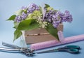 Sale of lilac bouquets in a wooden box. Royalty Free Stock Photo