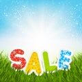 Sale message on green grass