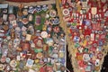 sale of metal badges at the flea market in Izmailovo in Moscow
