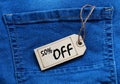 Sale minus 50 percent. Big sales fifty percent\'s on blue jean background. Royalty Free Stock Photo