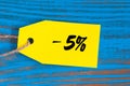 Sale minus 5 percent. Big sales five percents on blue wooden background for flyer, poster, shopping, sign, discount