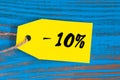Sale minus 10 percent. Big sales ten percents on blue wooden background for flyer, poster, shopping, sign, discount