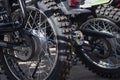 Sale of motorcycles in the open space.View of the rear wheels