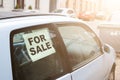 For sale. old dirty car on the street with inscription in the window Royalty Free Stock Photo