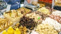 Sale of oriental sweets and ceramic tableware at the fair.