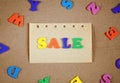 Vintage sale poster made of colored letters, cardboard and craft paper