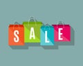 Sale poster with shopping bags