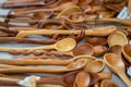 Sale of production of folk craftsmen on a market. Woodwork. Spoons and forks.